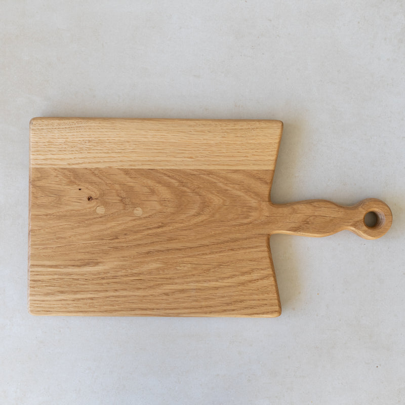 Medium chopping board against neutral background